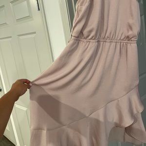 Dress. High to low dress never worn with tags